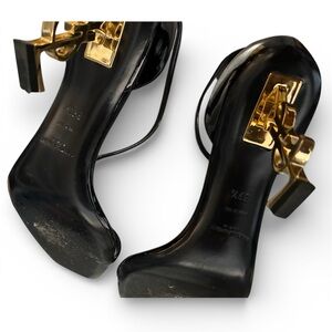 Yves Saint Laurent Black and Gold Heels